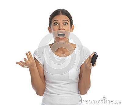 Surprised casual woman gasping and holding phone Stock Photo