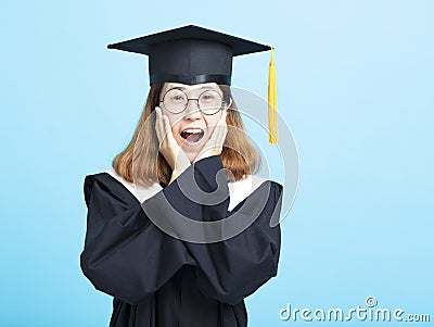 Surprised excited graduation student girl Stock Photo