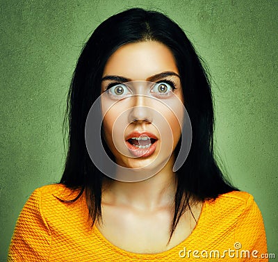 Surprised face of amazed shocked woman Stock Photo