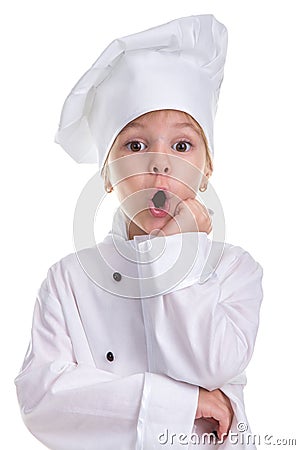 Surprised girl chef white uniform isolated on white background, looking straight at the camera, holding the hand under Stock Photo