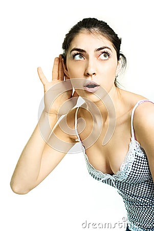 Surprised girl listening to something Stock Photo