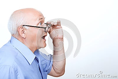 Surprised grandfather showing wonder Stock Photo