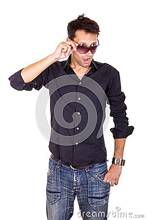 surprised handsome man looking under sunglasses making eye contact Stock Photo