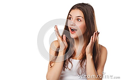 Surprised happy beautiful woman looking sideways in excitement. Isolated on white background Stock Photo