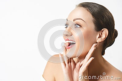 Surprised happy young woman looking sideways in excitement. Stock Photo