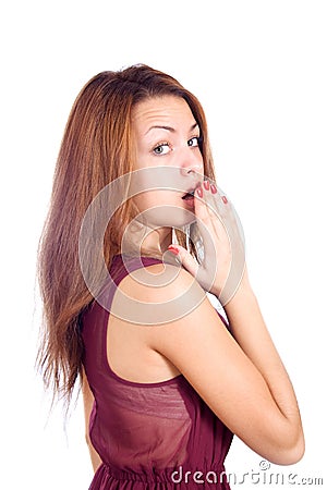 Surprised happy young woman looking sideways in excitement. Isolated over white Stock Photo