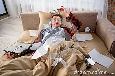 Guy wondering while lying in bed Stock Photo