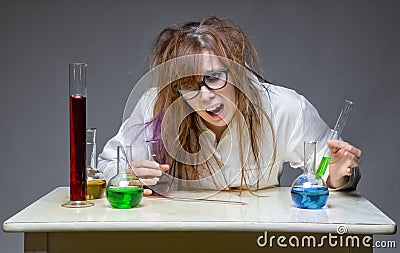 Surprised scientist with glass flask Stock Photo