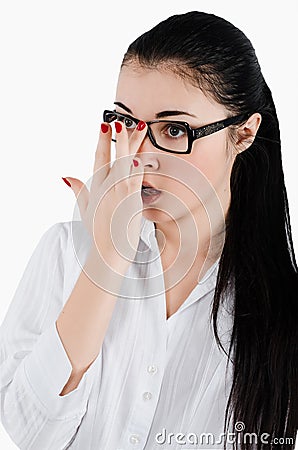 Surprised shocked business woman straightens Glasses for sight. Stock Photo