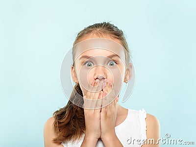 Surprised shocked girl cover mouth emotional face Stock Photo