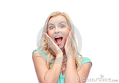 Surprised smiling young woman or teenage girl Stock Photo