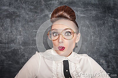 Surprised teacher with eyeglasses Stock Photo