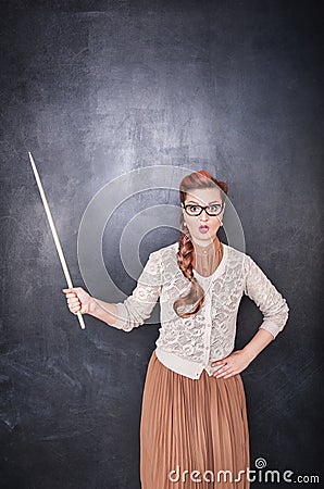 Surprised teacher with pointer Stock Photo