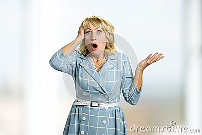 Surprised white-skin lady on white background. Stock Photo