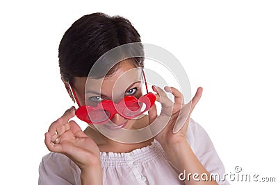 Surprised woman with funny glasses heart-shaped Stock Photo