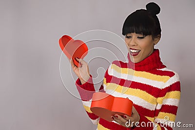 Surprised woman with gift box Stock Photo