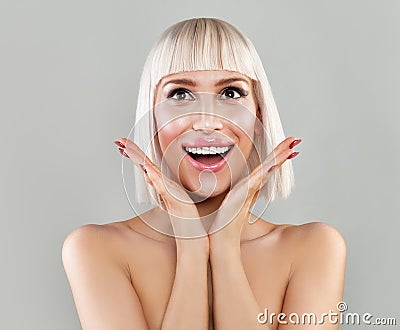 Surprised Woman with Open Mouth. Happy Blondie Model Stock Photo