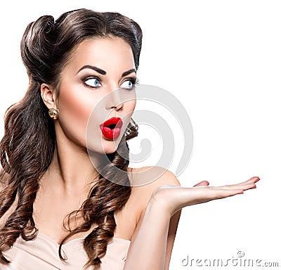 Surprised woman showing empty copy space Stock Photo