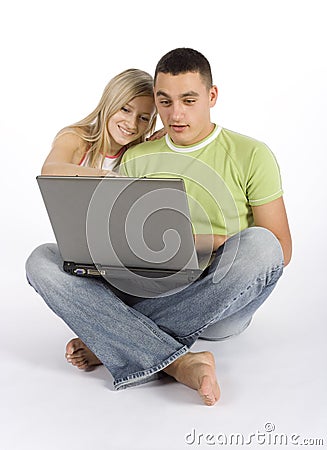 Surprised young couple with laptop Stock Photo