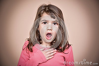 Surprised young girl Stock Photo