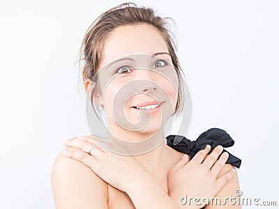 a Surprised young woman expressing positively excited hands on shoulders Stock Photo