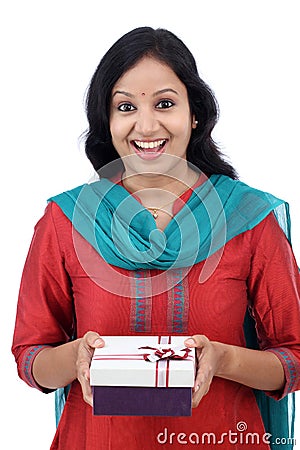 Surprised young woman with gift box Stock Photo