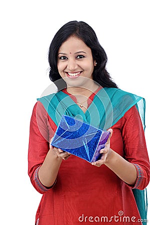 Surprised young woman with gift box Stock Photo