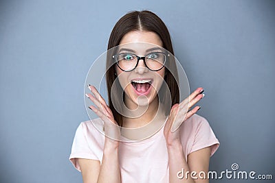 Surprised young woman in glasses Stock Photo