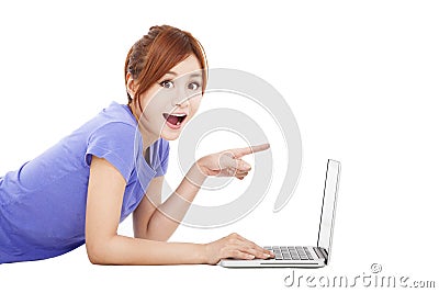 Surprised young woman with laptop Stock Photo