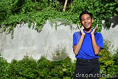 A Surprised Youthful Asian Boy Stock Photo