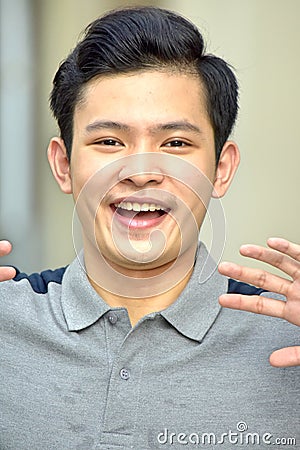 Surprised Youthful Chinese Person Stock Photo