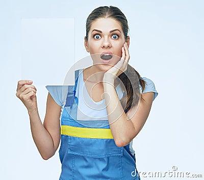 Surprising woman builder portrait with white banner Stock Photo