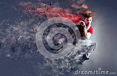 Surreal dancer decomposing in particles Stock Photo