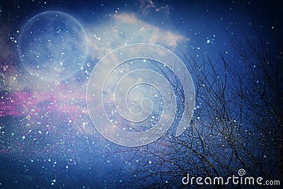 Surreal fantasy concept - full moon with stars glitter in night skies background. Stock Photo