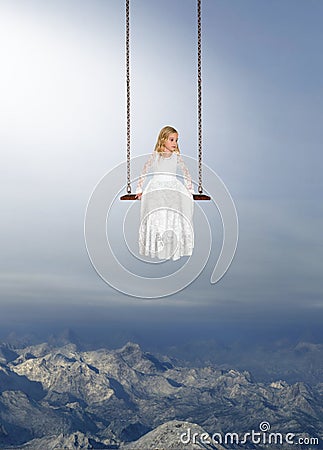 Surreal Girl, Swing, Mountains, Sky Stock Photo