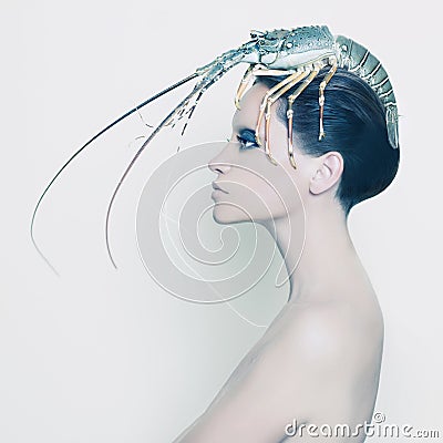 Surreal lady with lobster on her head Stock Photo