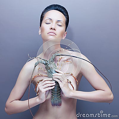 Surreal lady with lobster Stock Photo