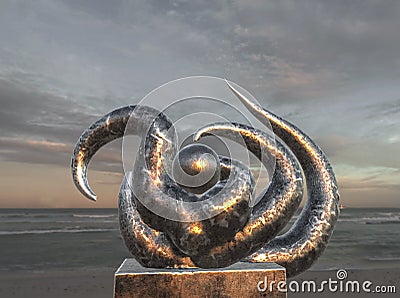 Surreal Metallic Sculpture On the Beach Stock Photo