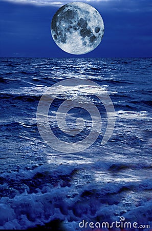 Surreal moon hovering above blue stormy water Stock Photo