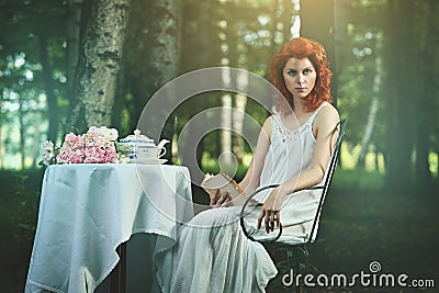 Surreal portrait of a beautiful redhead woman Stock Photo