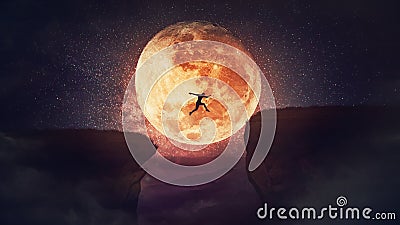 Surreal scene, self overcome concept, as determined man jump over a chasm obstacle. Way to win and success over starry night with Stock Photo