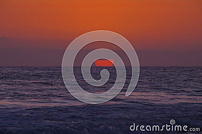 Surreal sunset over Pacific Ocean Stock Photo