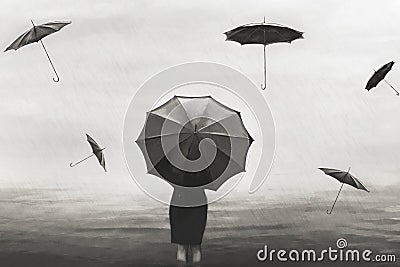 Surreal woman with umbrella in the rain with flying black umbrellas around Stock Photo