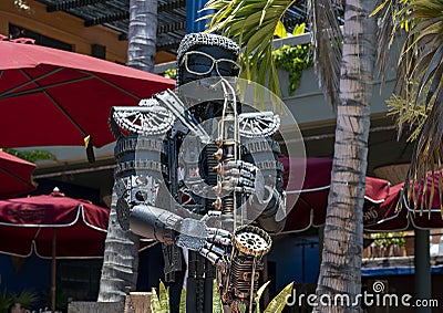 Surrealistic male saxophone-player sculpture in the courtyard of the La Coronela Restaurnt & Bar in Todos Santos. Editorial Stock Photo