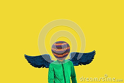 Surrealistic minimal concept. A balloon instead of a human head and wings behind the back. Minimalism and surrealism. My Stock Photo
