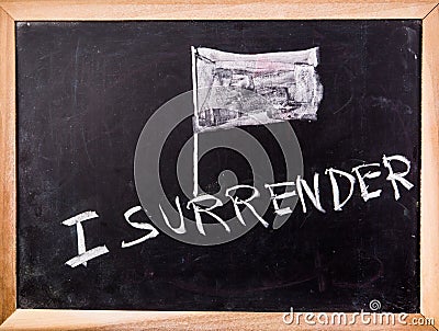 Surrender word on blackboard Stock Photo