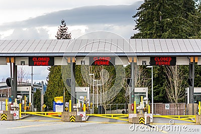 Surrey, Canada - Mar 29, 2020: Closed Canada border lanes during Covid-19 virus Editorial Stock Photo