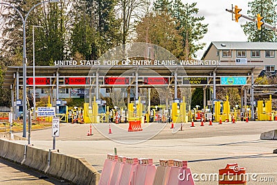 Surrey, Canada - Mar 29, 2020: Empty car lanes at Canada/USA border checkpoint Editorial Stock Photo