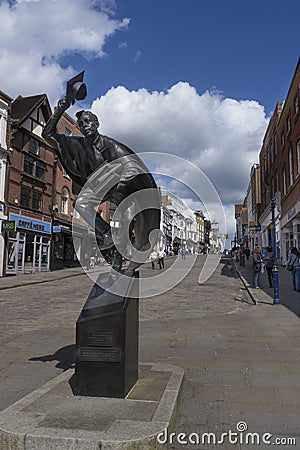 `The Surrey Scholar`. Statue in Guildford High Street Editorial Stock Photo