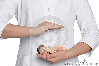 Surrogacy concept. Doctor holding adorable newborn baby on white background, closeup Stock Photo